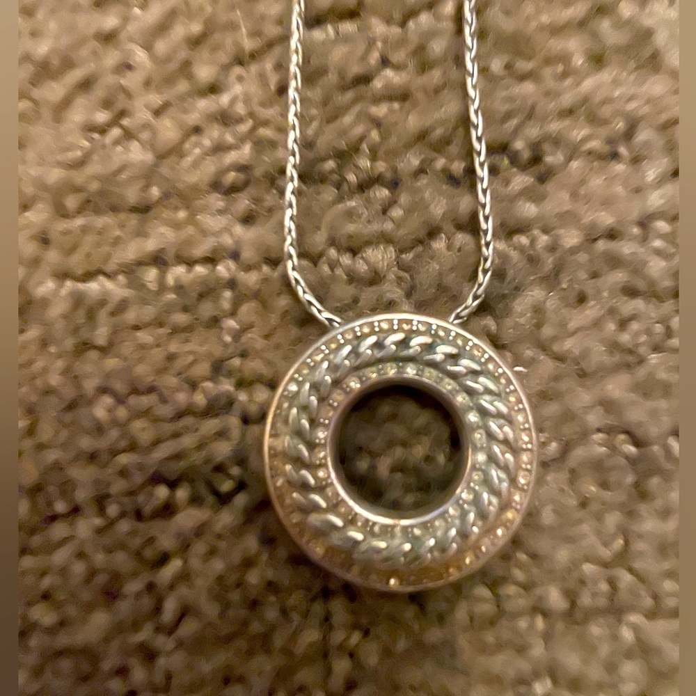 Brighton silver necklace.  16”-18” Adjustable. Lobster claw closure.